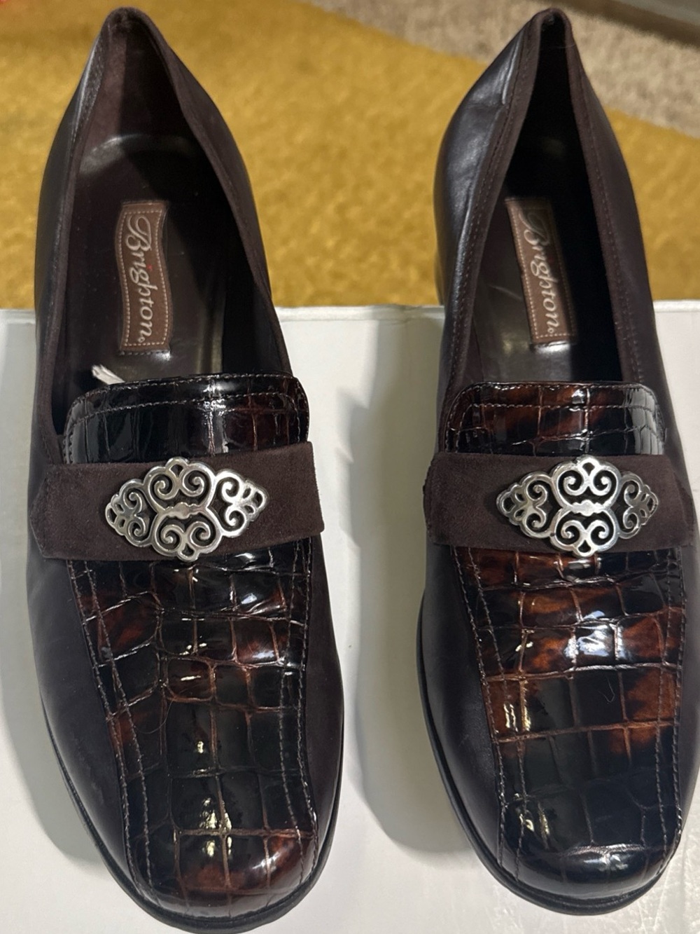 Brighton women’s Dark Brown Croc-Embossed Slip-Ons with Silver Accent